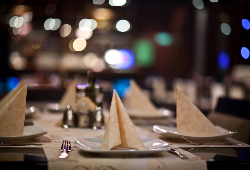 Table setting in a restaurant at night